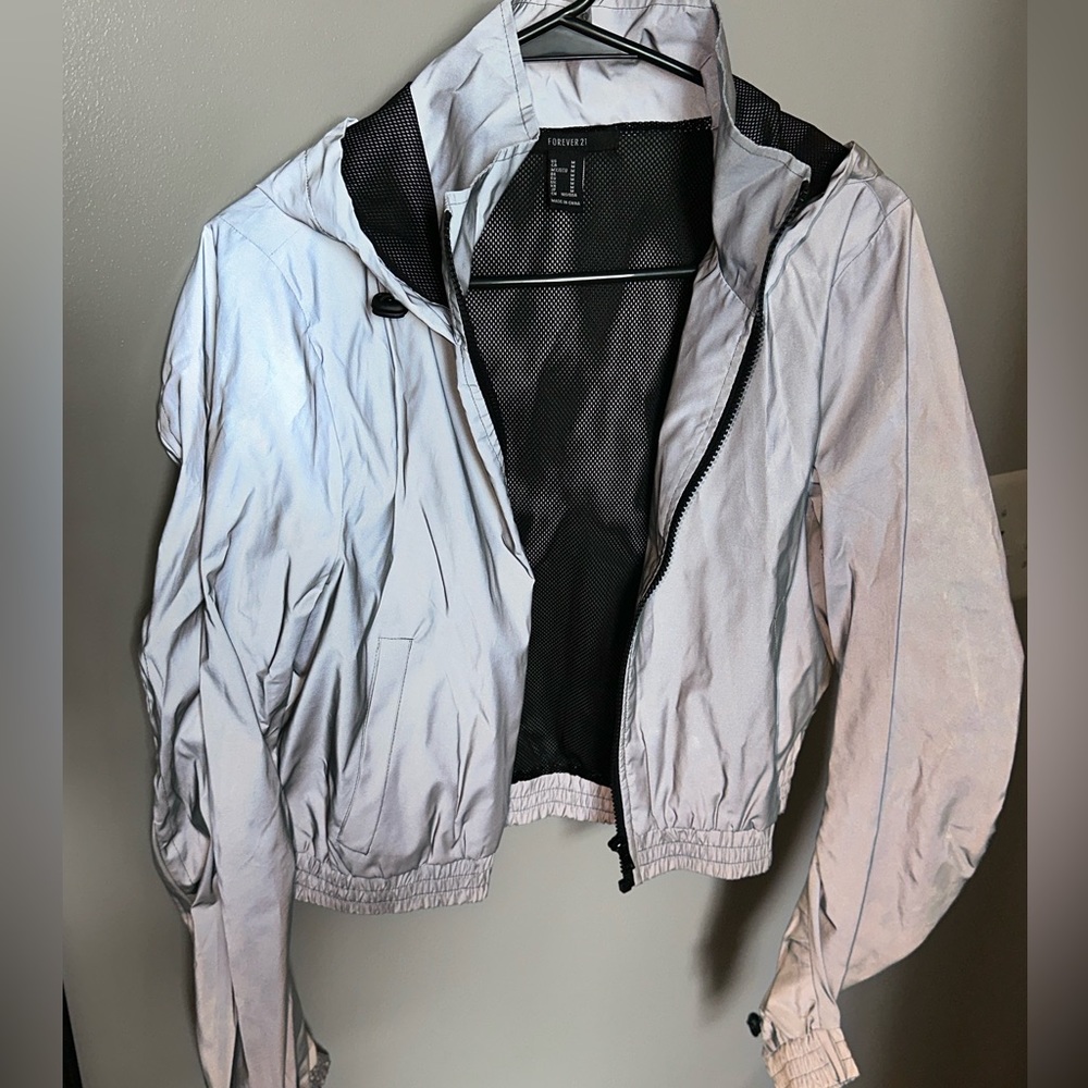 Women’s Reflective Windbreaker. Size Medium.